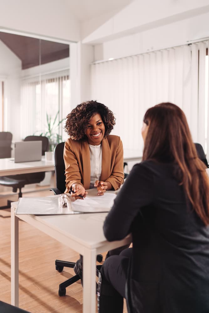 Engaging in a consultation with an insurance agent for personalized guidance on coverage and policy details.